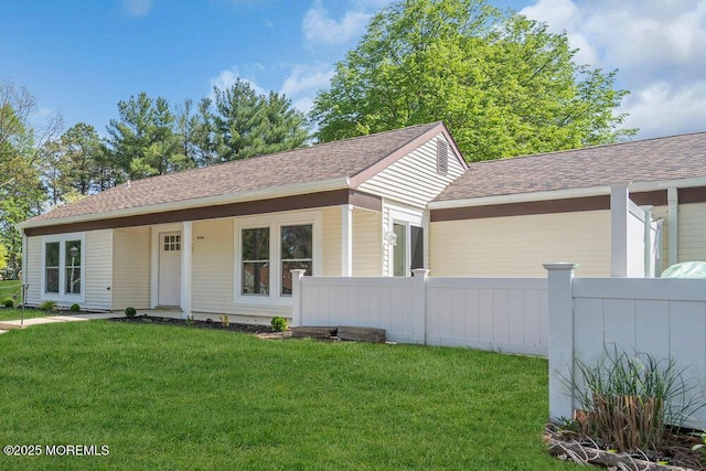 829A Westminster Ct, Manchester, NJ 08759 - single story home with fence, roof with shingles, and a front lawn
