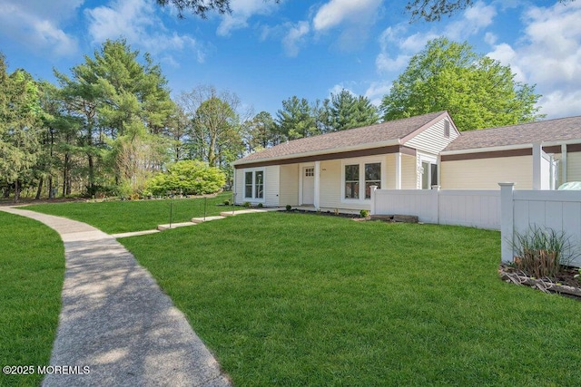 829A Westminster Ct, Manchester, NJ 08759 - view of front of property featuring roof with shingles, fence, and a front yard