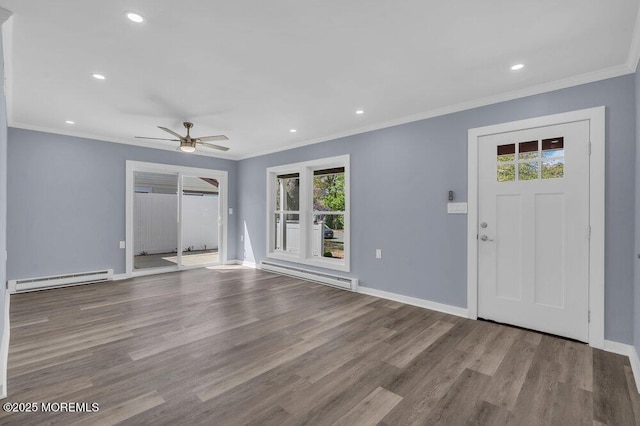 829A Westminster Ct, Manchester, NJ 08759 - entryway with crown molding, a ceiling fan, a baseboard heating unit, and wood finished floors