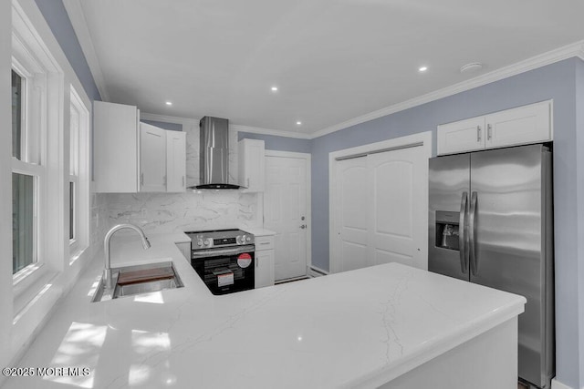 829A Westminster Ct, Manchester, NJ 08759 - kitchen featuring wall chimney range hood, stainless steel appliances, light stone countertops, and a sink