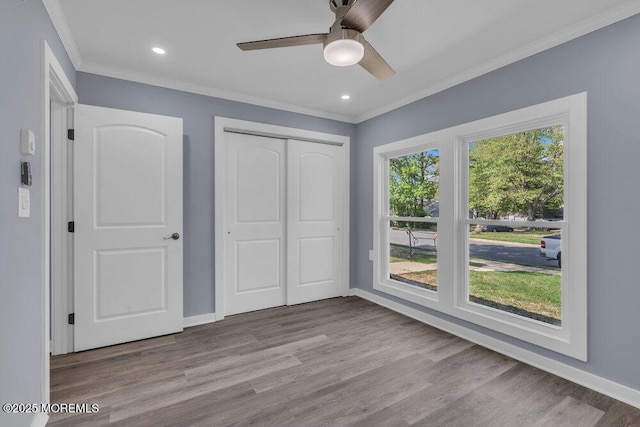 829A Westminster Ct, Manchester, NJ 08759 - unfurnished bedroom with crown molding, baseboards, and a closet