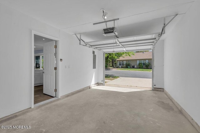 829A Westminster Ct, Manchester, NJ 08759 - garage with a garage door opener and electric panel