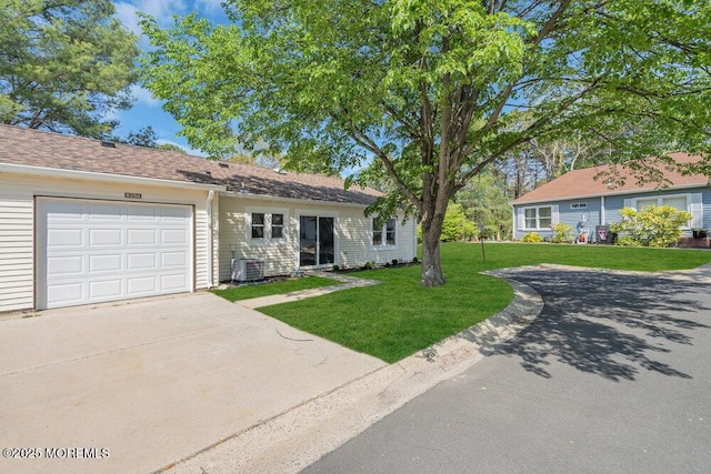 829A Westminster Ct, Manchester, NJ 08759 - ranch-style house featuring concrete driveway, an attached garage, cooling unit, and a front yard
