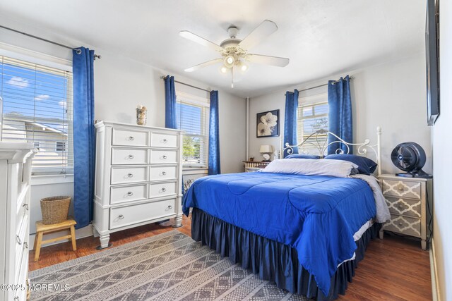 39-43 Twilight Ave, Keansburg, NJ 07734 - bedroom with a ceiling fan and wood finished floors