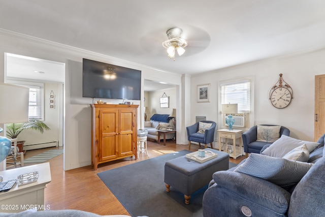 39-43 Twilight Ave, Keansburg, NJ 07734 - living area with ornamental molding, a healthy amount of sunlight, and a baseboard heating unit