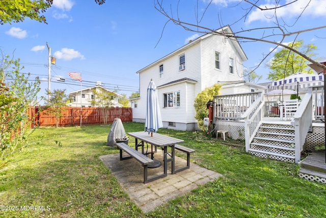 39-43 Twilight Ave, Keansburg, NJ 07734 - back of property with a lawn, a fenced backyard, a patio area, and a deck