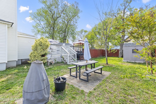 39-43 Twilight Ave, Keansburg, NJ 07734 - view of yard featuring a patio, a shed, an outbuilding, a fenced backyard, and a wooden deck