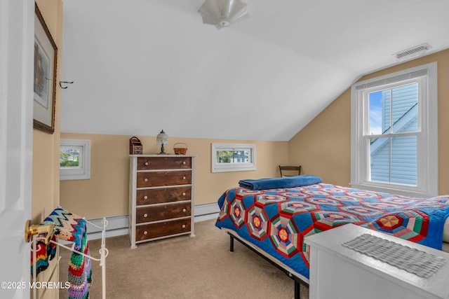 bedroom with carpet floors, baseboards, vaulted ceiling, a baseboard radiator, and visible vents
