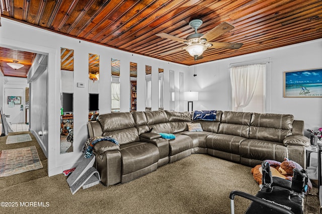 living area featuring carpet flooring, ceiling fan, and wood ceiling