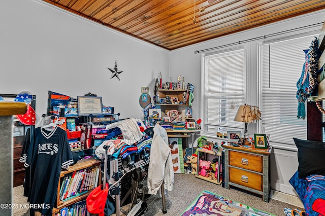 rec room with wooden ceiling and carpet