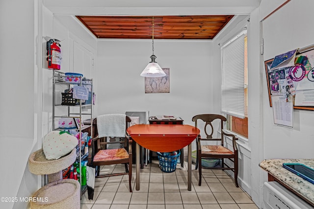 dining room featuring light tile patterned flooring