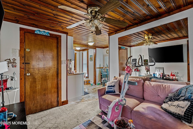 living area with a ceiling fan, carpet floors, and wooden ceiling