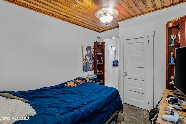 bedroom featuring carpet floors and wooden ceiling