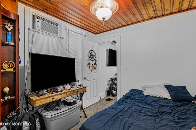 carpeted bedroom featuring wooden ceiling