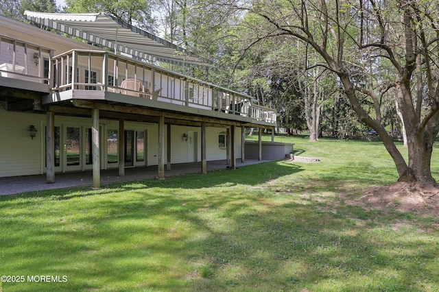 view of yard with a wooden deck