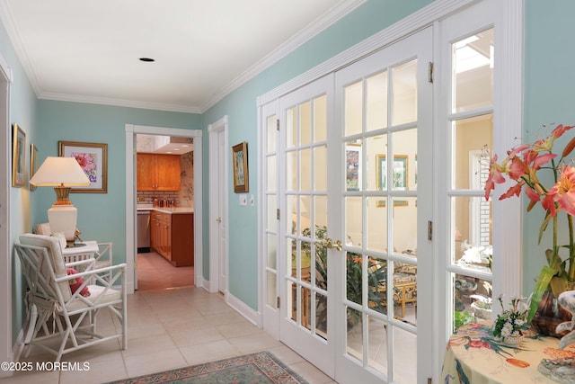 entryway with baseboards, ornamental molding, french doors, and light tile patterned flooring