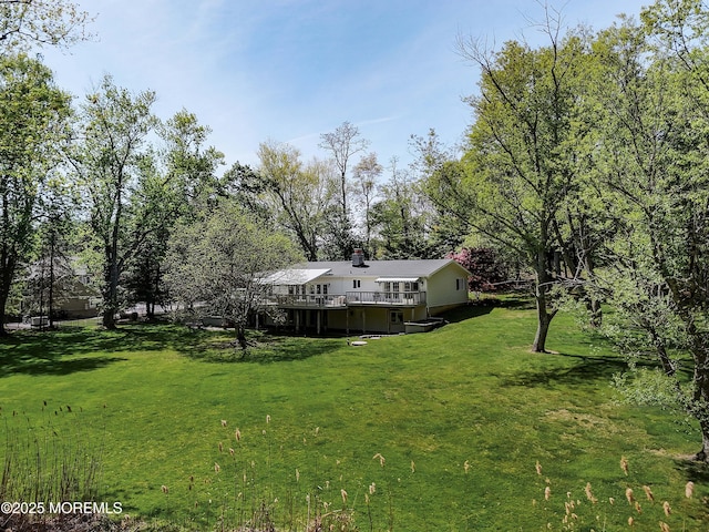 view of yard featuring a deck