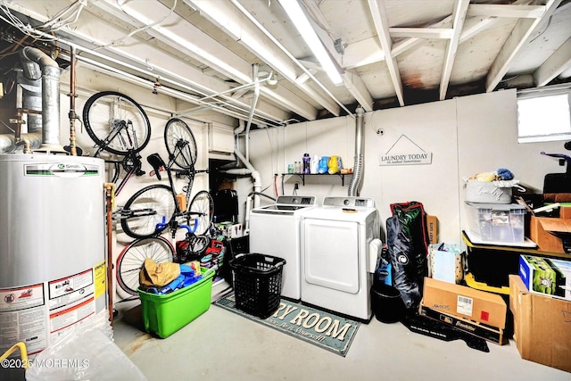 below grade area featuring washer and clothes dryer and gas water heater