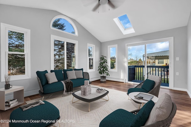 8 Venezia St, Toms River, NJ 08757 - living room with a ceiling fan, a healthy amount of sunlight, lofted ceiling with skylight, and wood finished floors