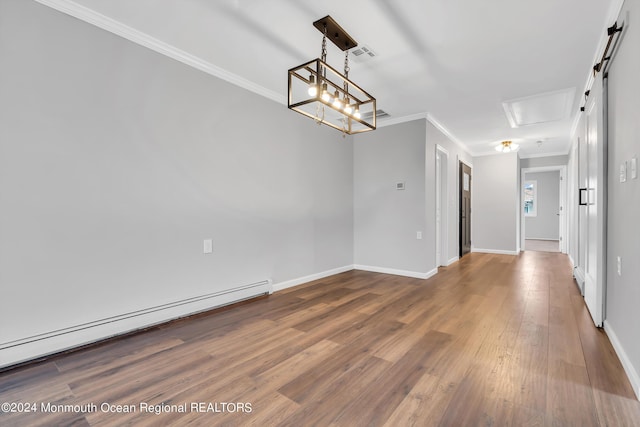 8 Venezia St, Toms River, NJ 08757 - empty room featuring visible vents, crown molding, wood finished floors, baseboards, and a baseboard radiator