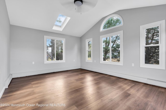8 Venezia St, Toms River, NJ 08757 - interior space featuring baseboards, ceiling fan, wood finished floors, and vaulted ceiling with skylight