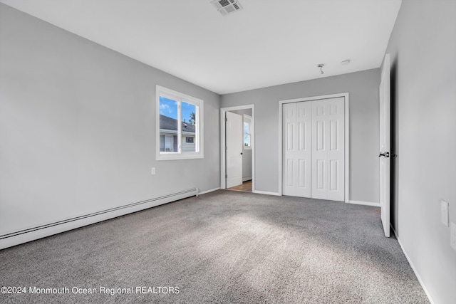 8 Venezia St, Toms River, NJ 08757 - unfurnished bedroom with carpet flooring, a baseboard heating unit, visible vents, and a closet