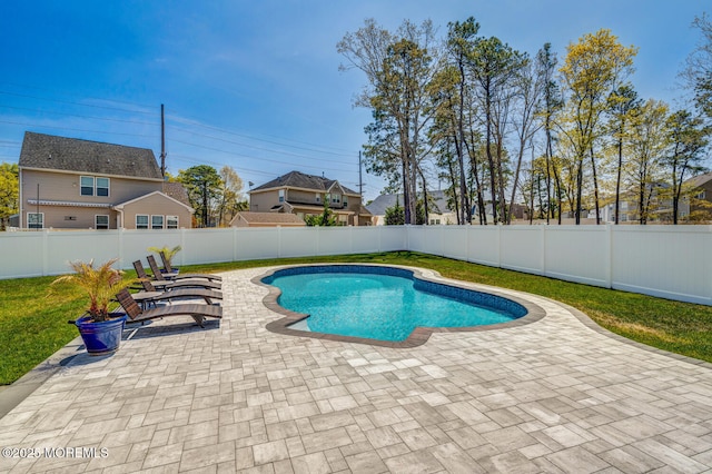 view of pool featuring a patio, a fenced in pool, and a fenced backyard