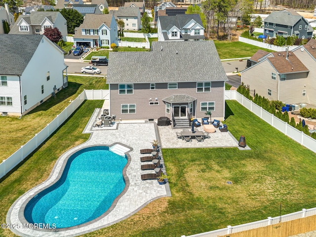 exterior space with a patio, a residential view, a fenced backyard, and entry steps