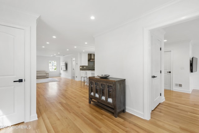 196 Highwood Rd, Oakhurst, NJ 07755 - hall with recessed lighting, ornamental molding, light wood-style floors, and visible vents