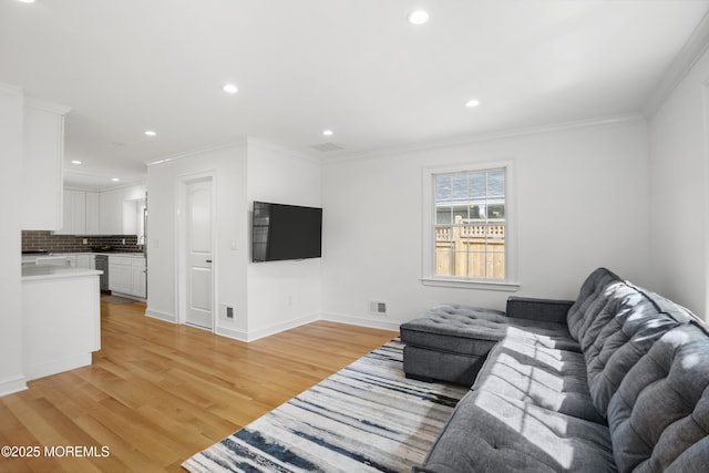 196 Highwood Rd, Oakhurst, NJ 07755 - living area featuring crown molding, recessed lighting, light wood-type flooring, and visible vents
