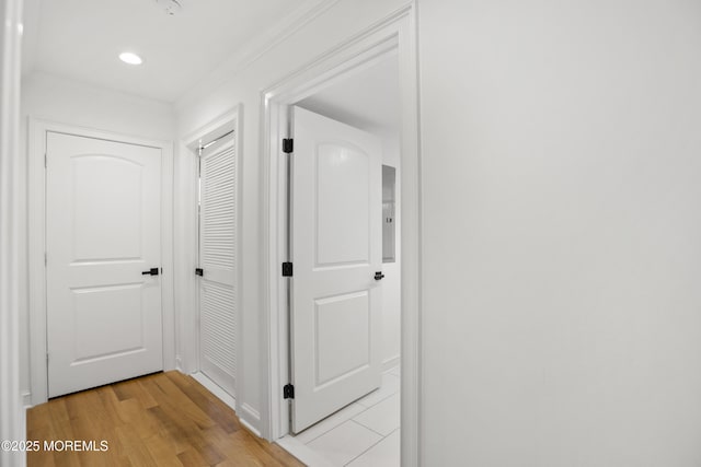 196 Highwood Rd, Oakhurst, NJ 07755 - hallway with crown molding, electric panel, recessed lighting, and light wood-style flooring