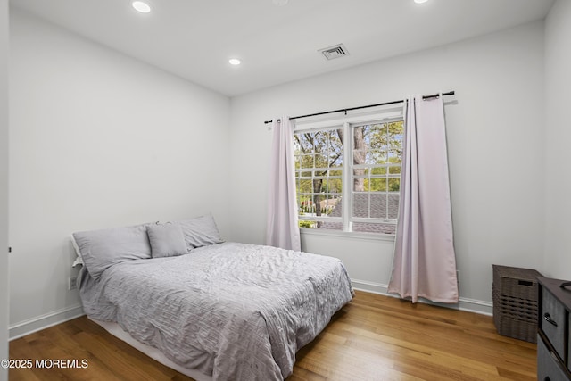 196 Highwood Rd, Oakhurst, NJ 07755 - bedroom with recessed lighting, baseboards, visible vents, and wood finished floors
