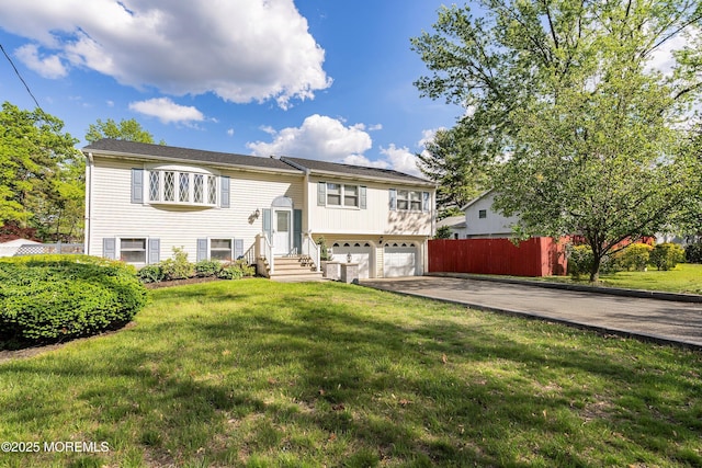 443 Lafayette Dr, Brick, NJ 08723 - raised ranch featuring concrete driveway and a garage