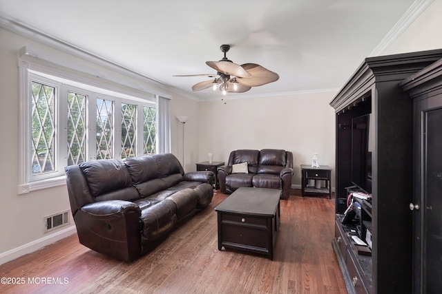 443 Lafayette Dr, Brick, NJ 08723 - living room with ornamental molding, ceiling fan, baseboards, and wood finished floors
