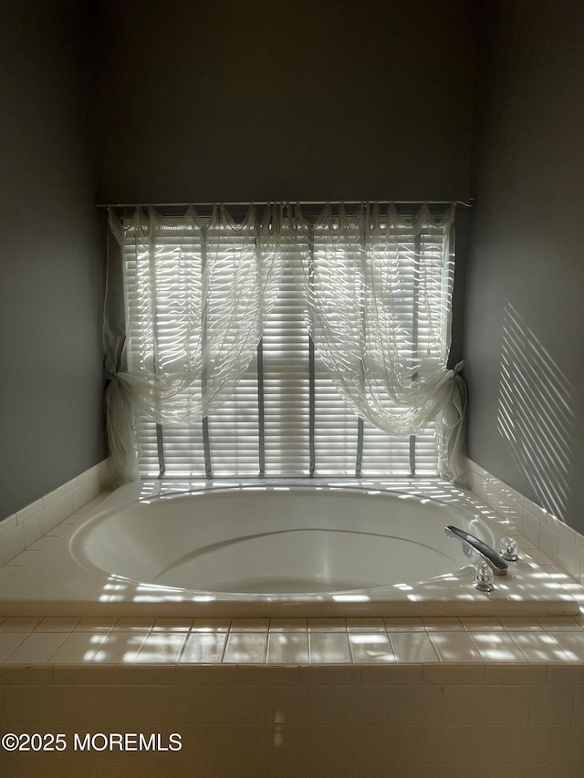 full bath featuring a garden tub