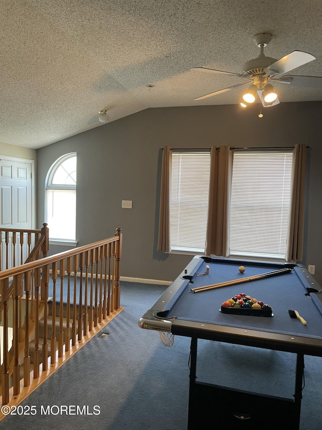 game room with ceiling fan, a textured ceiling, pool table, lofted ceiling, and carpet