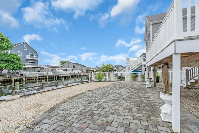 40 Anchorage Dr, Toms River, NJ 08753 - view of property's community with stairway, a dock, a residential view, boat lift, and fence