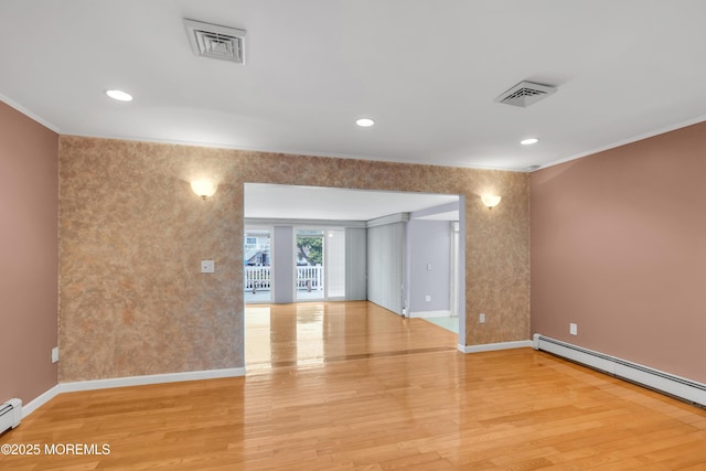 40 Anchorage Dr, Toms River, NJ 08753 - spare room featuring ornamental molding, a baseboard heating unit, baseboards, light wood-style floors, and recessed lighting
