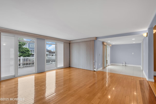 40 Anchorage Dr, Toms River, NJ 08753 - spare room with light wood finished floors, baseboards, and baseboard heating