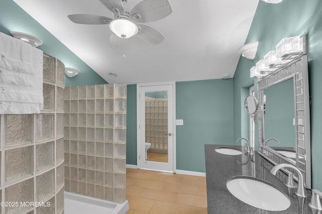 40 Anchorage Dr, Toms River, NJ 08753 - full bathroom with walk in shower, ceiling fan, vaulted ceiling, double vanity, and baseboards