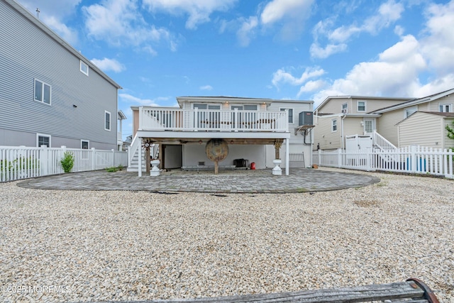 40 Anchorage Dr, Toms River, NJ 08753 - rear view of house with stairway, a patio area, a wooden deck, a fenced backyard, and cooling unit