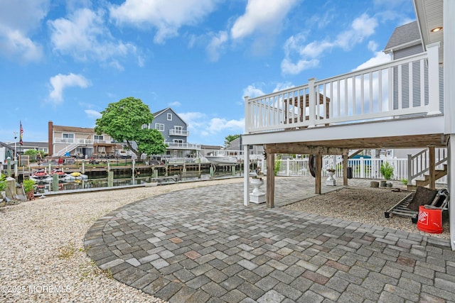 40 Anchorage Dr, Toms River, NJ 08753 - view of patio / terrace with stairs, a deck with water view, fence, and a residential view