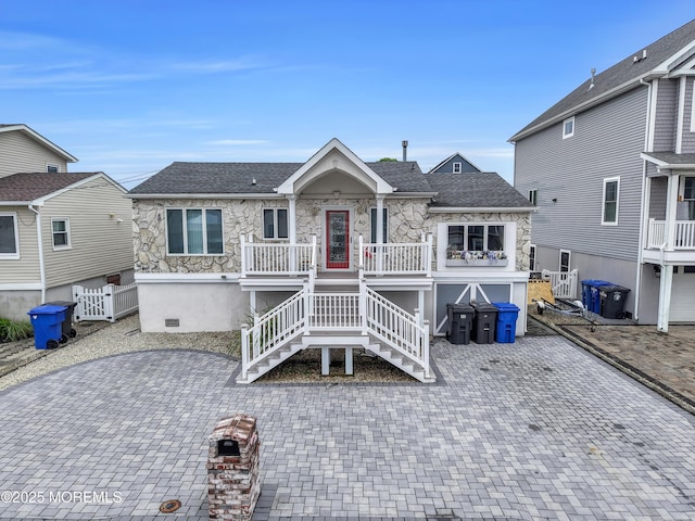 40 Anchorage Dr, Toms River, NJ 08753 - view of front of home with stone siding, covered porch, stairway, and a shingled roof