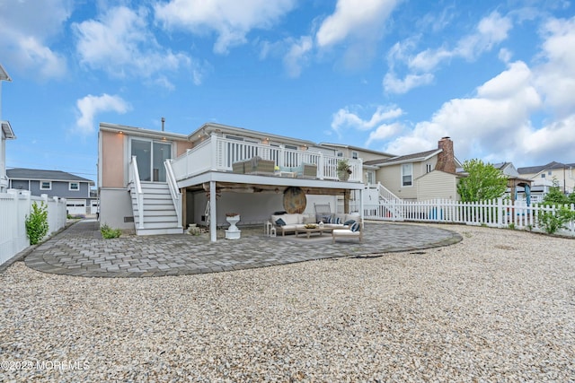 40 Anchorage Dr, Toms River, NJ 08753 - back of property with stairway, outdoor lounge area, a patio, and a fenced backyard