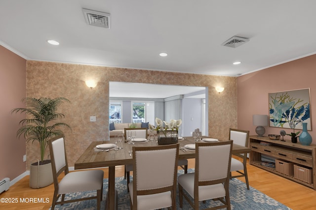 40 Anchorage Dr, Toms River, NJ 08753 - dining space featuring light wood-style floors, ornamental molding, a baseboard radiator, baseboards, and recessed lighting
