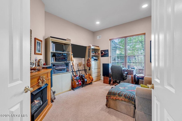 carpeted office with recessed lighting