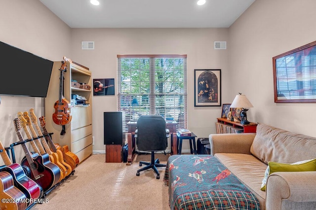 carpeted office with recessed lighting