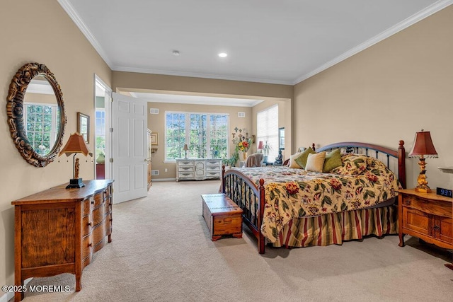 carpeted bedroom featuring crown molding, baseboards, and recessed lighting