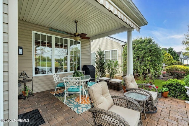 view of patio / terrace with a ceiling fan