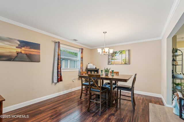 2024 Mount Carmel Blvd, Toms River, NJ 08753 - dining room featuring crown molding, dark wood-type flooring, and baseboards